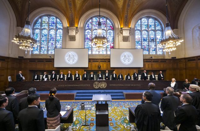 The Members of the Court on the first day of the hearings